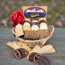 Load image into Gallery viewer, Basket of assorted cookies and pretzels with a visible brand label on a wooden surface.