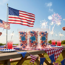 Load image into Gallery viewer, Upright favor size bags of red, white and blueberry glazed popcorn