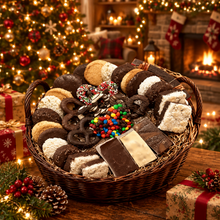 Load image into Gallery viewer, A gift basket in a Christmas scene with macaroons from Tripicians and fudge and assorted chocolate covered pretzels