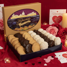 Load image into Gallery viewer, Box of Tripician's macaroons with a colorful background