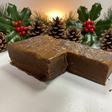 Load image into Gallery viewer, A piece of chocolate fudge with caramel and sea salt sprinkled on top
