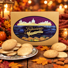 Load image into Gallery viewer, A gift box of Tripician's brand almond macaroons in a cozy autumn background
